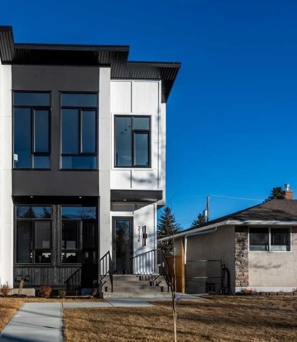 The finished Glenbrook duplex we built in 2025 — 5 bed, 4 bath with a legal basement suite